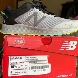 New Balance running shoe. Never worn. Size 10.5.